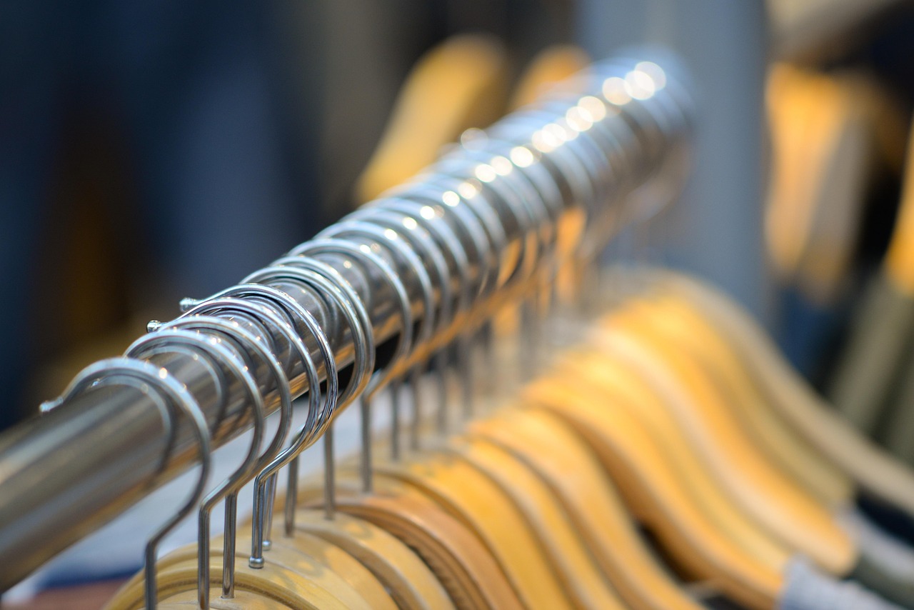 Wooden hangers on the rail
